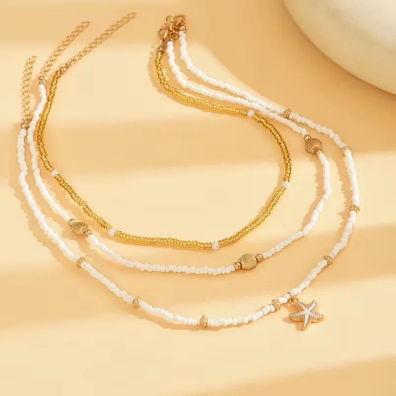 Shell and Star Necklace - Light and Layered