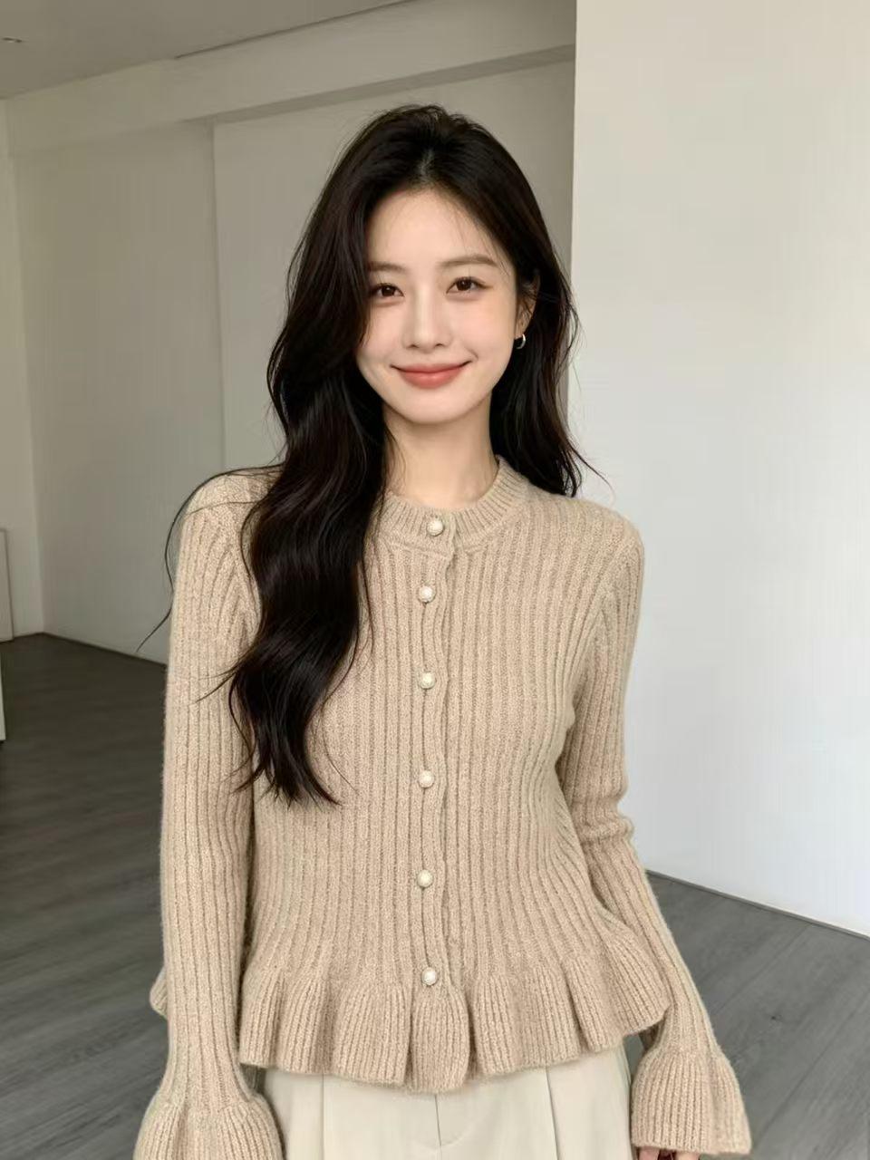 Ruffled Flared-Sleeve Knit Blouse - Elegant and Feminine