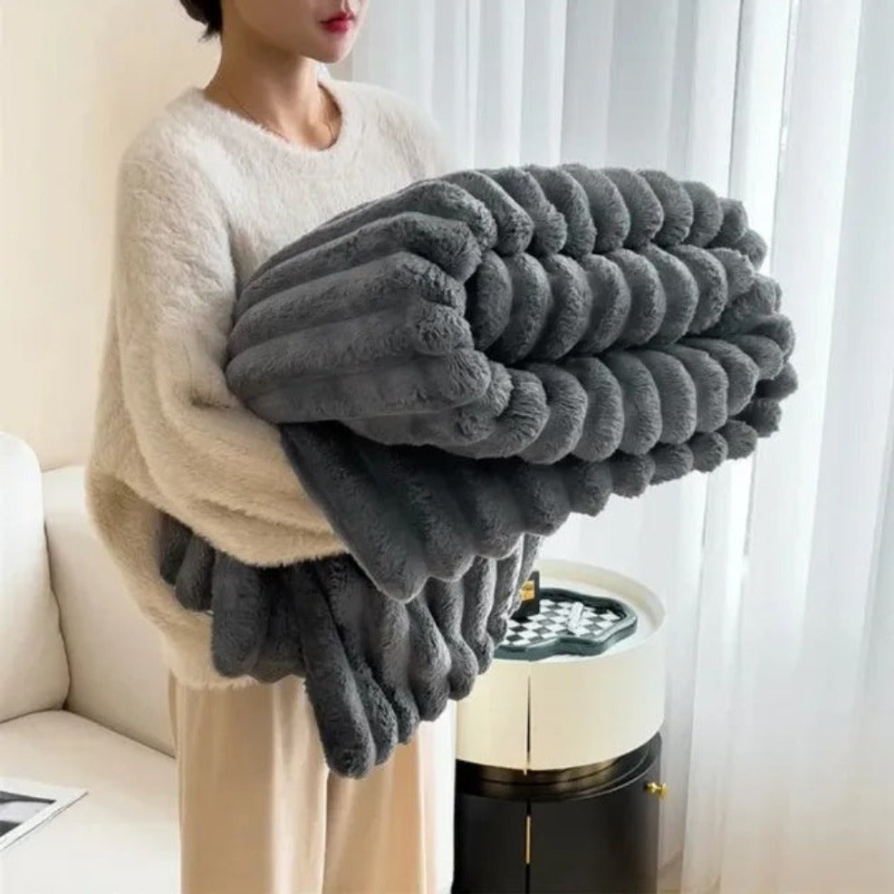 Ultrazachte geribbelde plaidstof voor warmte en comfort.