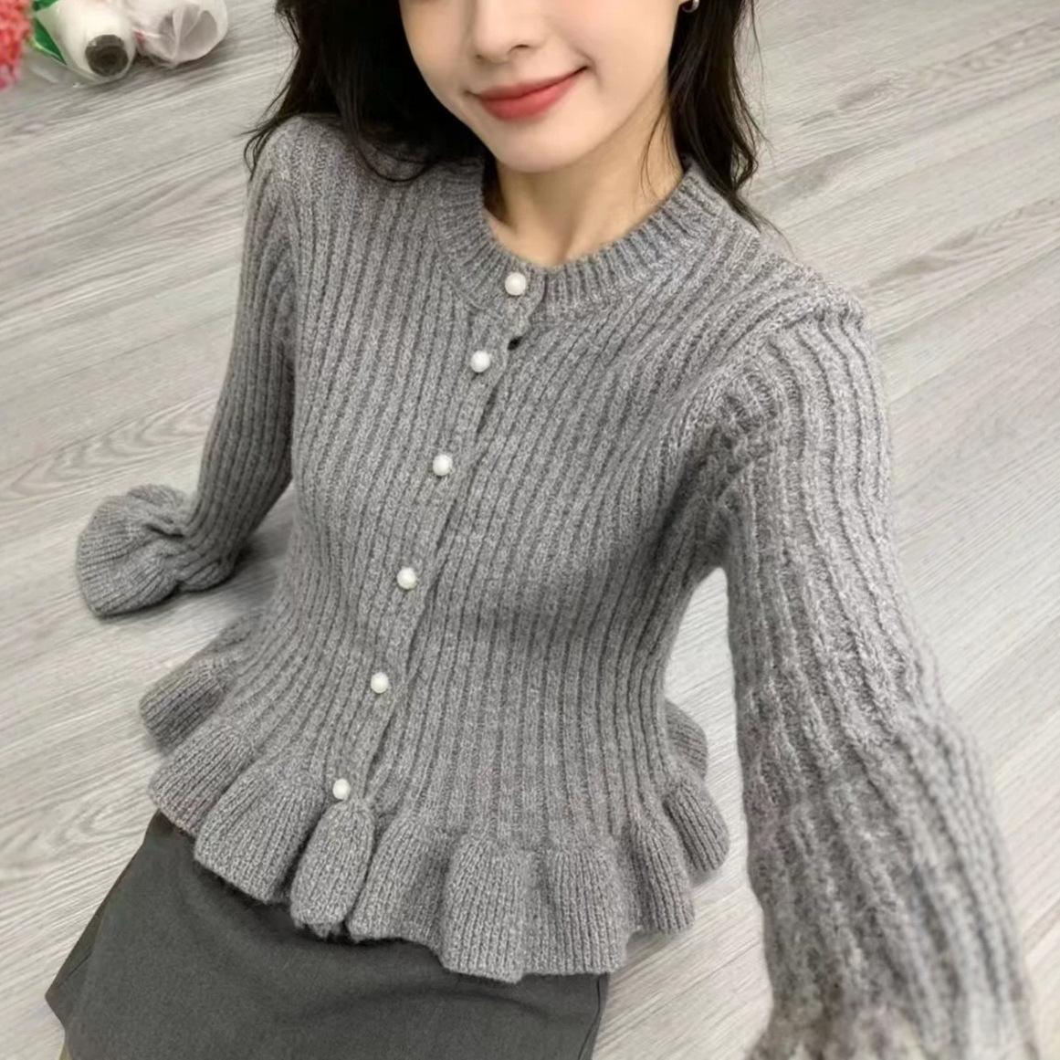 Ruffled Flared-Sleeve Knit Blouse - Elegant and Feminine