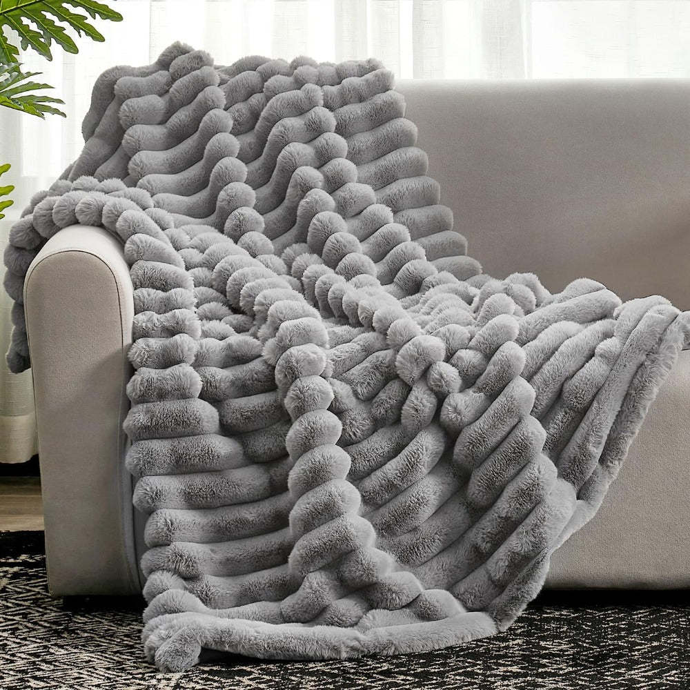 Ultrazachte geribbelde plaidstof voor warmte en comfort.