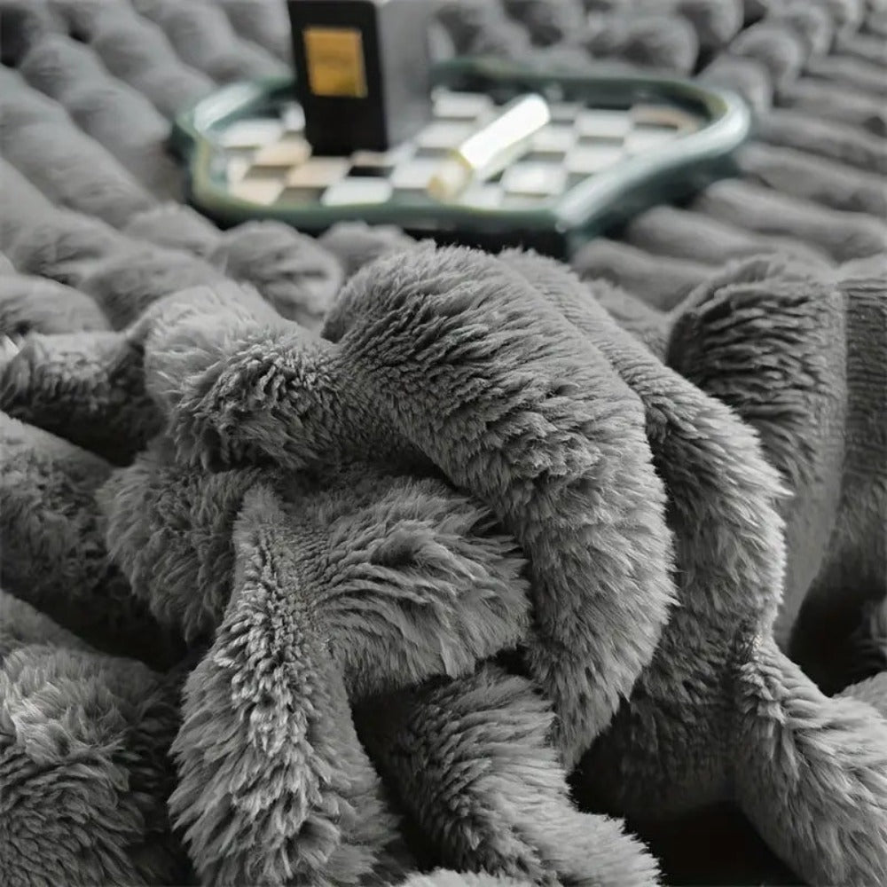 Ultrazachte geribbelde plaidstof voor warmte en comfort.
