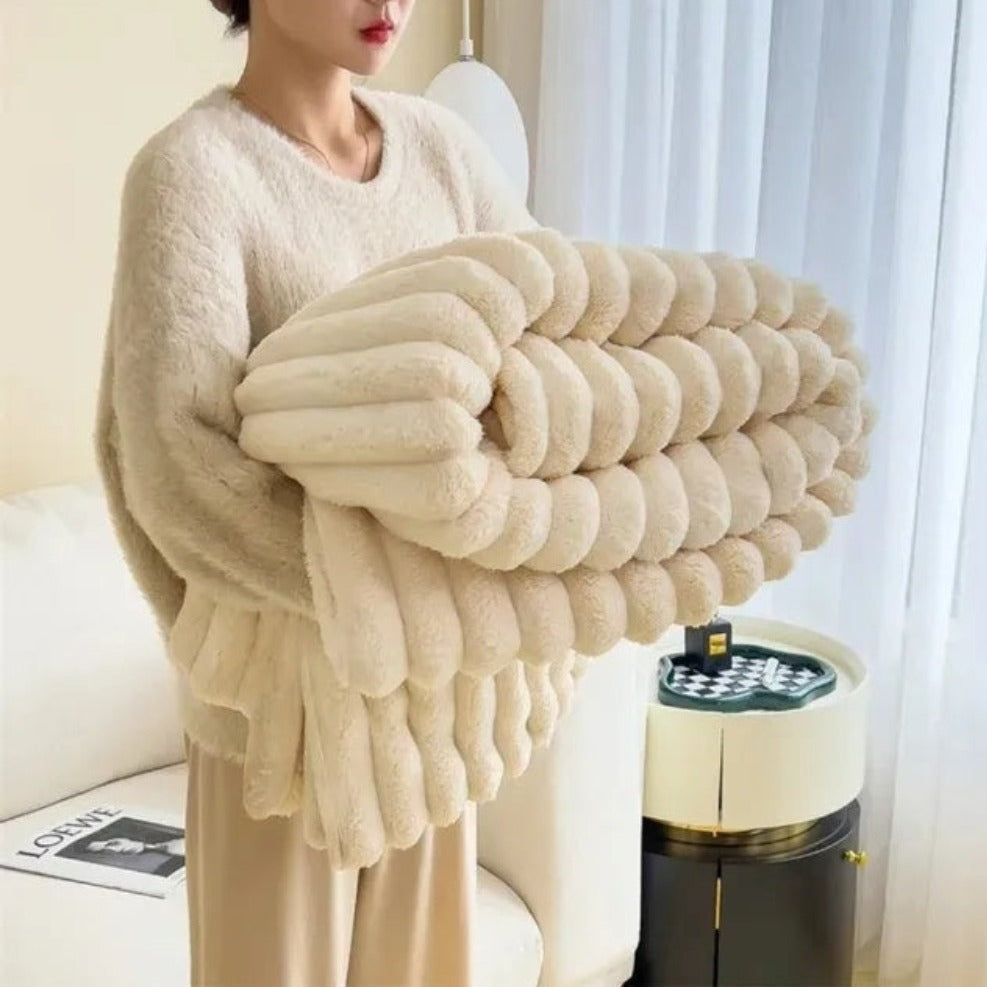 Ultrazachte geribbelde plaidstof voor warmte en comfort.