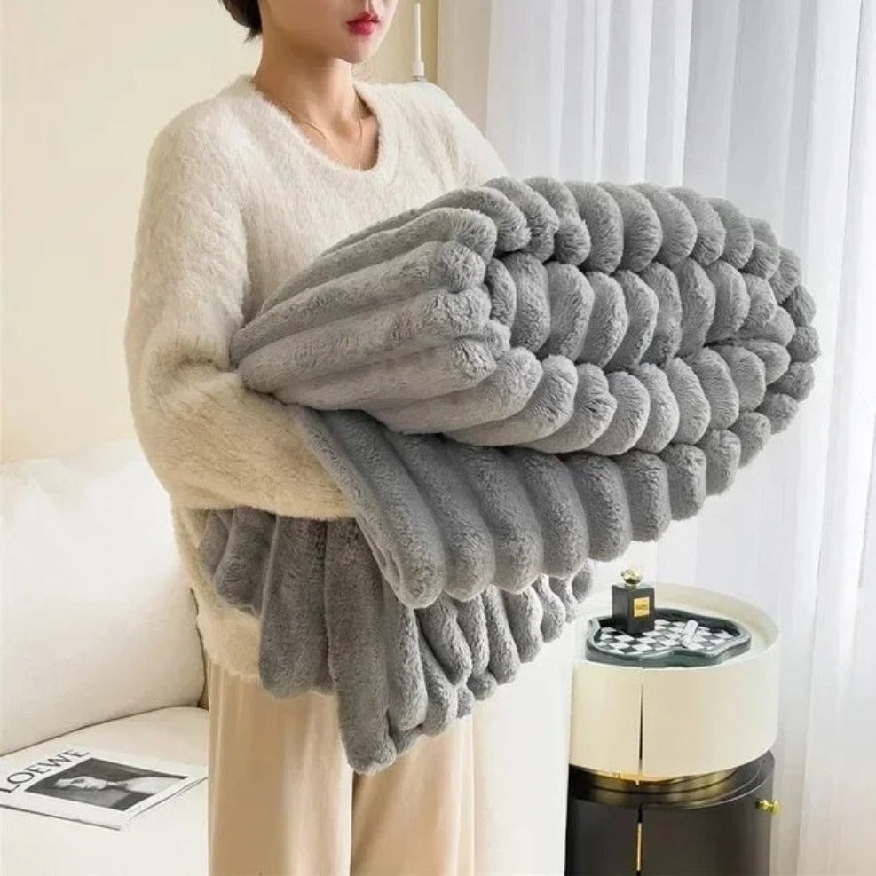 Ultrazachte geribbelde plaidstof voor warmte en comfort.