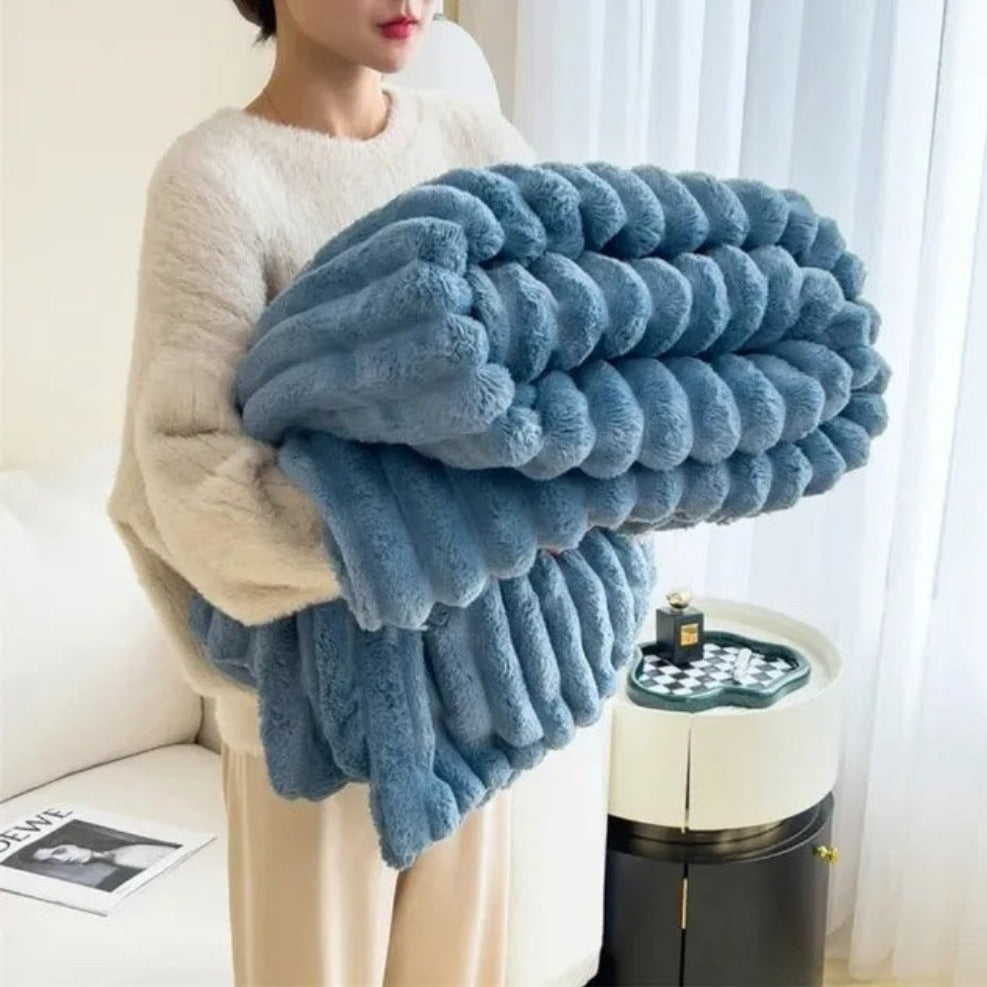 Ultrazachte geribbelde plaidstof voor warmte en comfort.